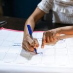 person scheduling calendar